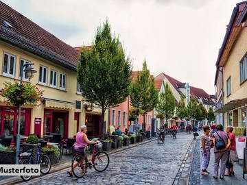 Wohn und Geschäftshaus in Aspach
